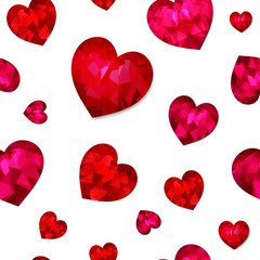 Seamless pattern with red and pink volumetric hearts in low-poly style.