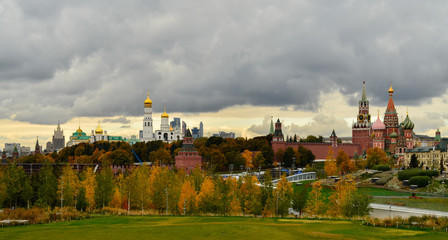 Fototapeta premium Panorama of the Moscow Kremlin. Kremlin clock tower on Red Square in Moscow, Russia. St. Basil's Cathedral on the Red Square of Russia in Moscow.