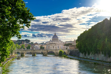 Fototapeta premium A view along the Tiber River towards St. Peter's Basilica in Rome, Italy.