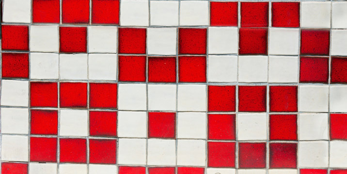 Vintage tile knee wall on exterior of old store.