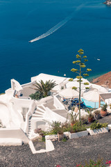 View on the seaside of Santorini island with ship on the sea