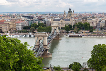 Fototapeta na wymiar View at Budapest with St. Stephen Basilica and chain bridge