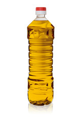 Closed plastic bottle with vegetable oil isolated on a white background with reflection