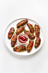 Bacon wrapped grilled chicken wings