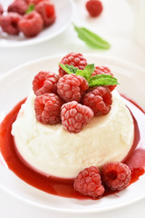 Panna cotta with fresh raspberries
