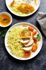 Chicken breasts in apricot sauce and couscous