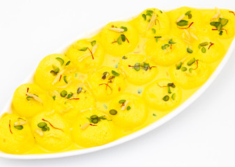 Indian Traditional Special Dessert Ras Malai Also Know as Rasmalai or Rossomalai on White Background