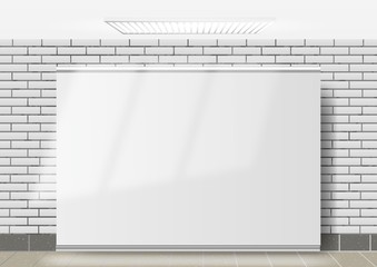 Exhibition stand roll-up, wide banner, against a brick wall