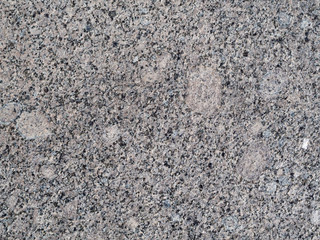 Granite granular texture with stains texture, granite surface and background.