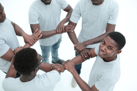 group of diverse guys standing in a circle . isolated on white