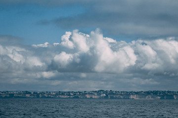 Naklejka na ściany i meble Clouds Over Sea
