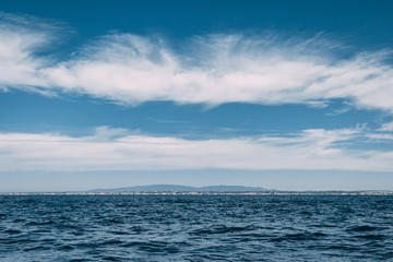Obraz premium Blue Sky with Few Clouds
