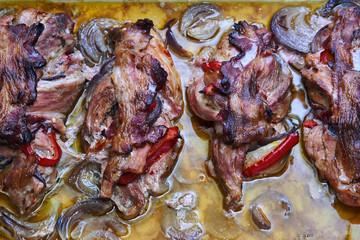 Close up of roast pork fried in roasting pan - traditional Polish dish