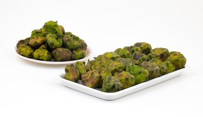 Close up of Fresh Organic Raw Water Chestnuts Also Know as Hingora, Hingoda, Singhara or Water Caltrop