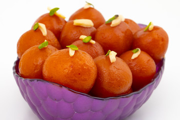 Indian Popular Dessert Gulab Jamun Also know as kala Jamun or Kalajam is a Soft Delicious Berry Sized Balls Made of Milk Solids