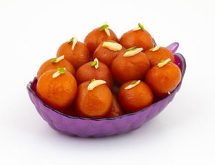 Indian Popular Dessert Gulab Jamun Also know as kala Jamun or Kalajam is a Soft Delicious Berry Sized Balls Made of Milk Solids