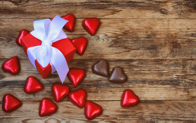 Valentine's day greeting card, red gift box and chocolate heart