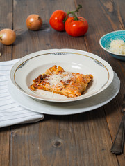 Portion delicious lasagne from above