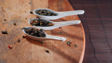 Still life with different varieties of tea, dry tea leaf. making of tasty and healthy hot drink.