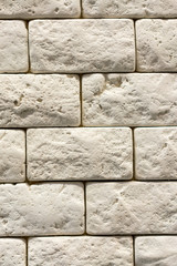 Gray wall background of concrete block texture. vertical photo