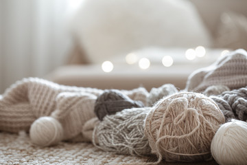 Fototapeta na wymiar Home Hobbies, knitting threads on the table.