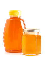 Jars of Raw Natural Honey on a White Background
