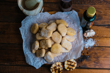 chicken nuggets composition on a wooden background