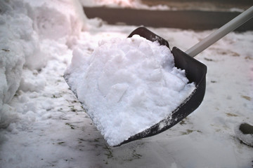 snow man shovel push sweep skipper clearing