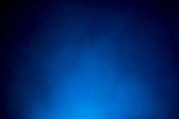 Blue bokeh mistical abstract background. Defocused light. Main color of year 2020.