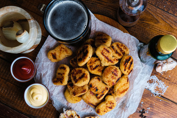 chicken nuggets composition on a wooden background