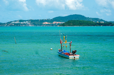 Floating boat in the sea