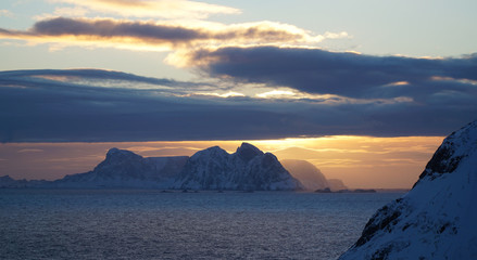 Wild camping during sunset at Å village near Reine during winter at the Lofoten Islands of Norway.