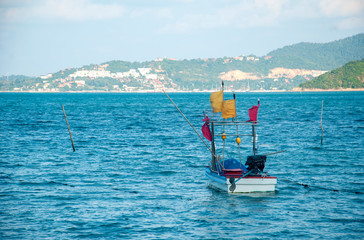 Floating boat in the sea