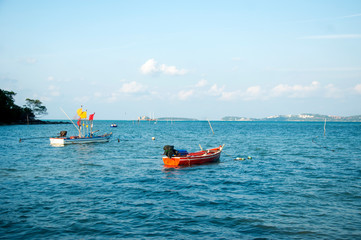 Floating boat in the sea