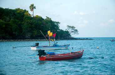 Fototapeta na wymiar Floating boat in the sea