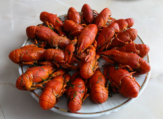 Red boiled crayfish on a plate