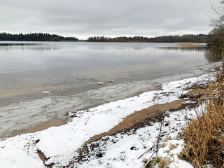 Valdai lake in winter in cloudy January day        