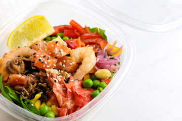 Tasty Hawaiian poke bowl  on light background