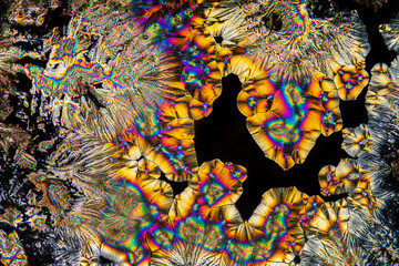 Extreme macro photograph of Vitamin C crystals forming abstract modern art patterns, when...