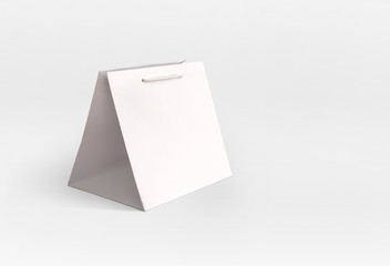 closed elegant white paper bag