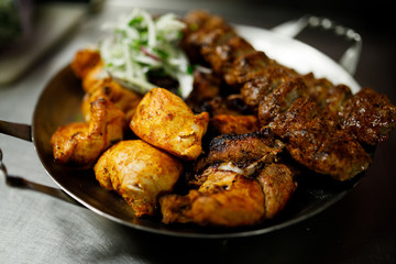 Plate with different fried meat