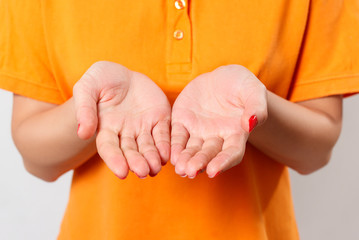 two women's hands, palms up, empty. close up