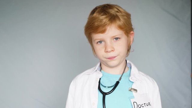 Young boy dressed as a doctor with stethoscope