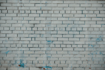 Fototapeta na wymiar white background of a brick wall. a horizontal view photo
