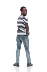 stylish young man looking back. isolated on white