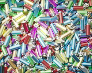 Lightly Colored Metal Spray Cans in a Messy Chaotic Pile From Aerial Perspective