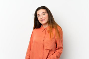 Obraz premium Young brunette girl over isolated white background laughing
