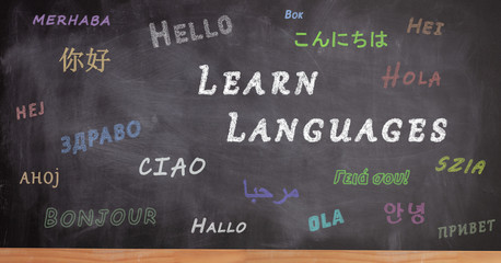 School blackboard written with hello in different languages
