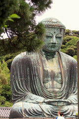 Kamakura, Japan - July 27, 2019: Monumental bronze statue of the Great Buddha in Kamakura