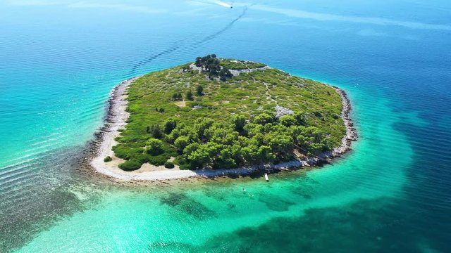 Beautiful blue seascape, islands on Adriatic sea in Croatia near Pakostane, drone circle aerial footage